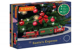 Hornby Santa's Express rechargeable battery operated train track set in its retail packaging, featuring a Christmas tree decorated with ornaments and a red Santa locomotive.